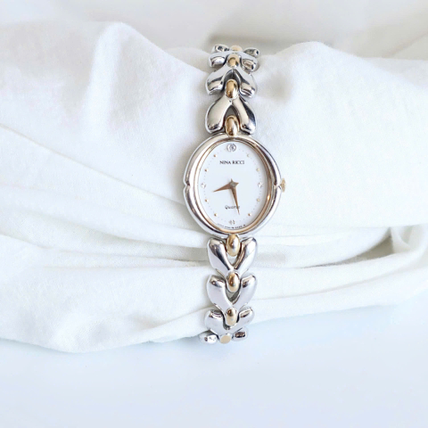 The Clock Nina Ricci 